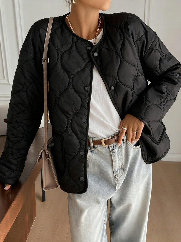 Damen Steppjacke mit Knopfleiste und Rundhalsausschnitt